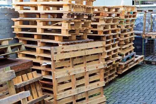 Electric low-carbon vans parked ready for commercial collection